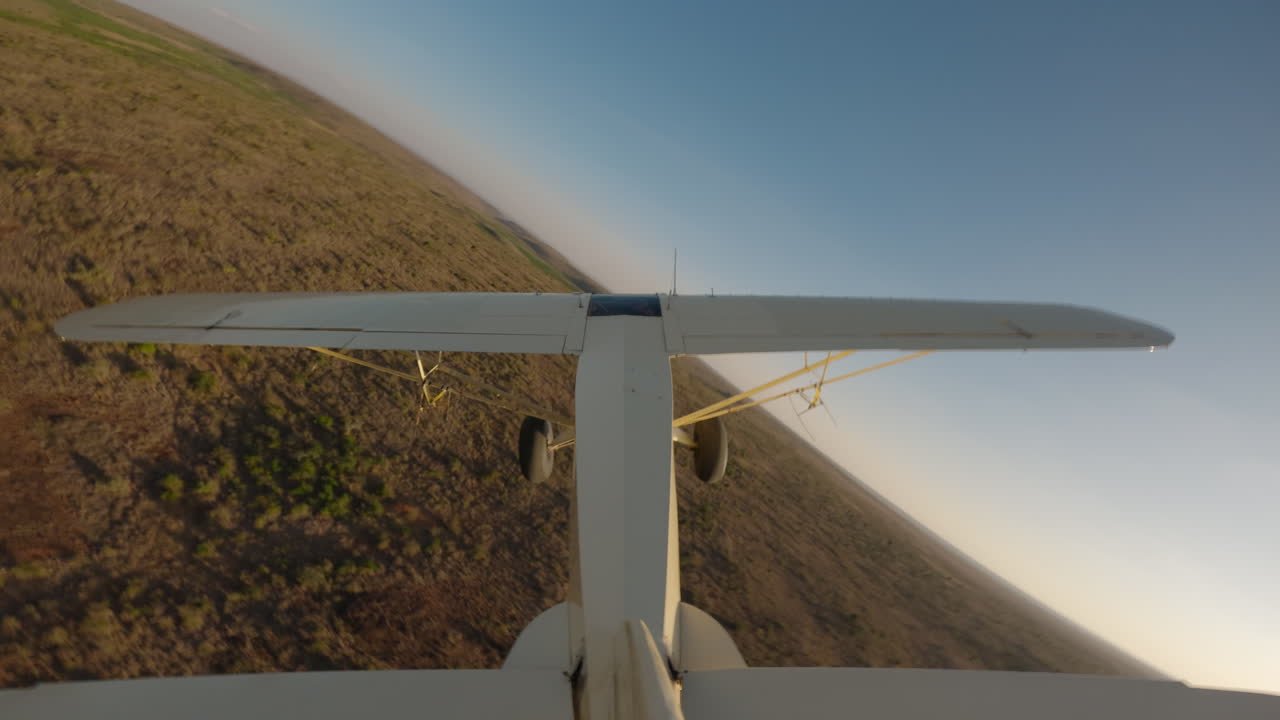 Bushcraft plane flying over a plain in savannah