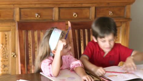 Two children painting together 2