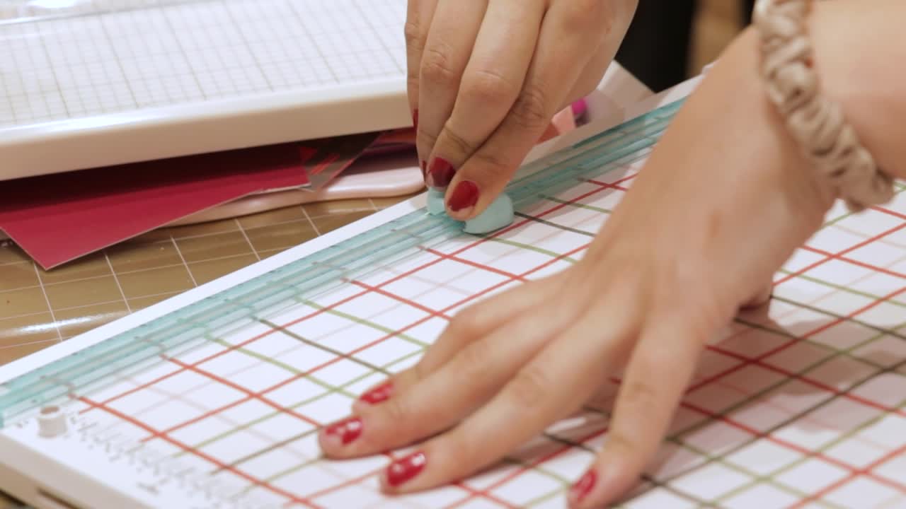 Cutting patterned paper with cutting board, paper arts and crafts