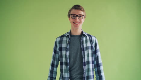 man with glasses, smiling and surprised