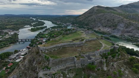 ancient stone walls of rozafa castle on mountain in scodra in albania, aerial