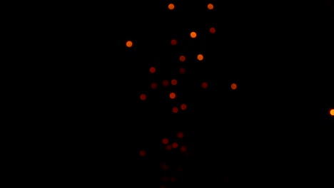 el bokeh borroso amarillo se mueve sobre un fondo negro