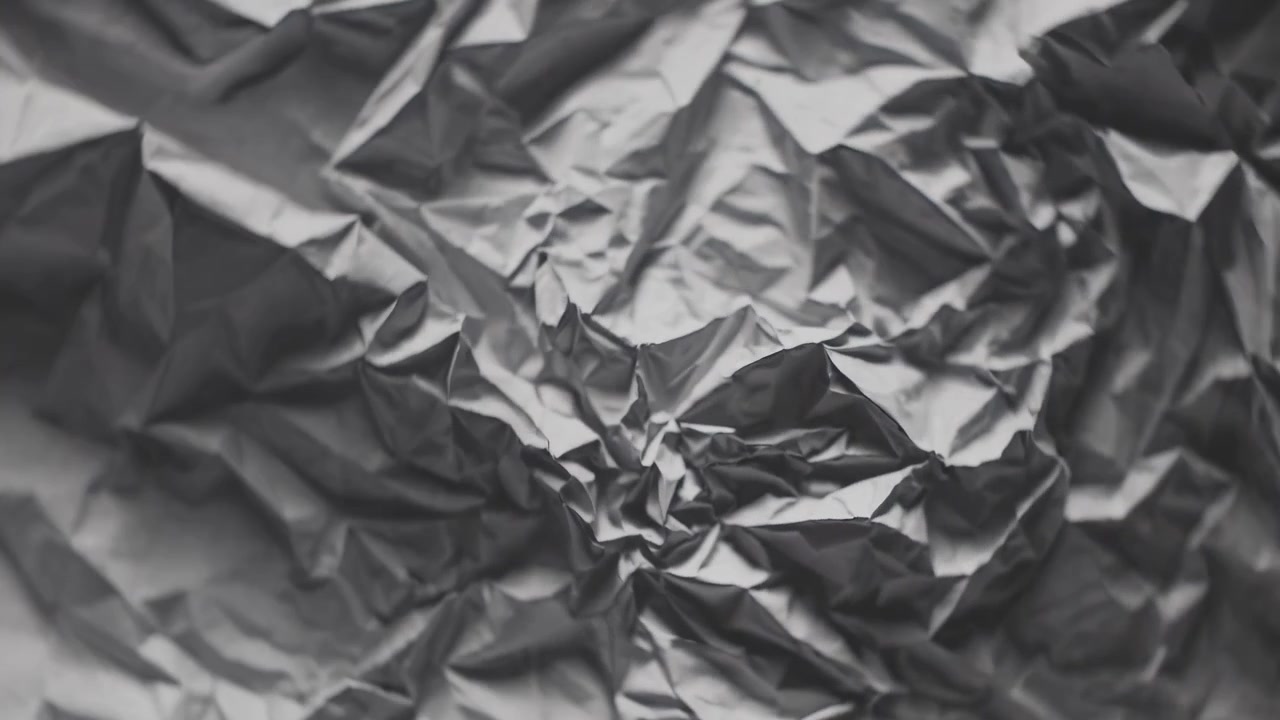 Seamless Loop of Abstract Crumpled Metallic Foil Texture