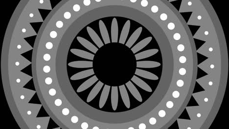 patrón gráfico en blanco y negro con efecto estroboscópico e hipnótico, mientras gira en el sentido de las agujas del reloj y aumenta de tamaño.