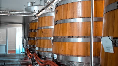 large wooden barrel in a winery, sinaia, romania