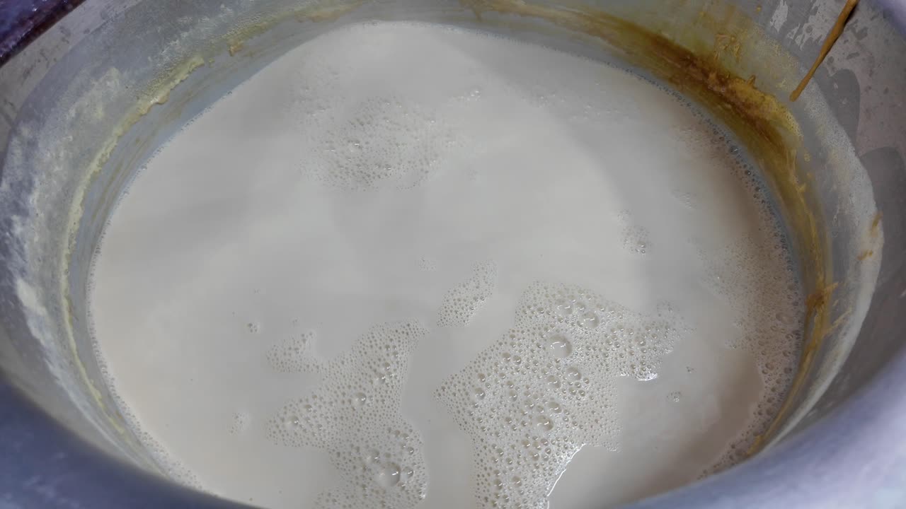 Close-up of milk in a container