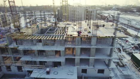 construction of a multi-story building in winter