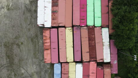 top down drone shot of containers in hafrestroms foretagspark during the day, industry in asensbruk, dalsland, sweden