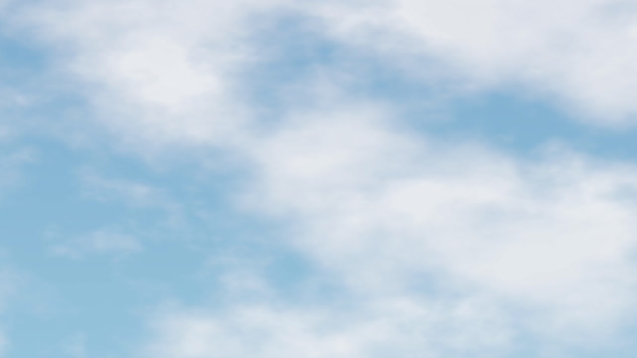 Smooth forward camera movement glides through soft white clouds against a bright blue sky