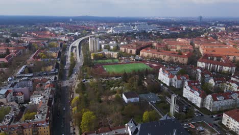 Beautiful-aerial-top-view-flight-Berlin-City-Soccer-football-field,-district-Steglitz-Germany