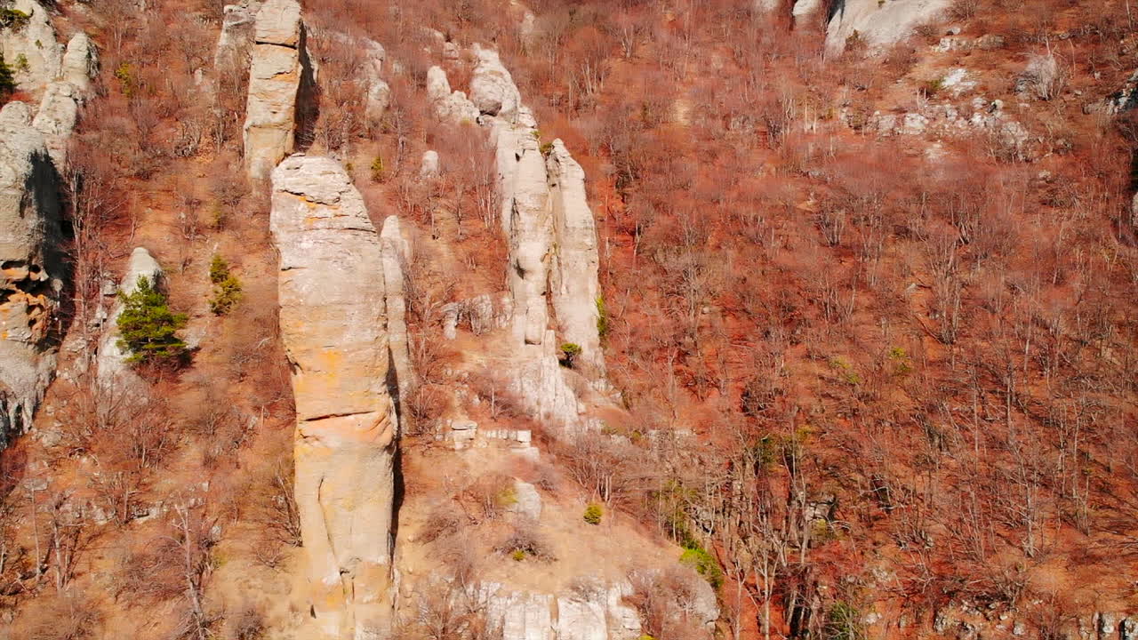 Rock Formations and Autumnal Landscape