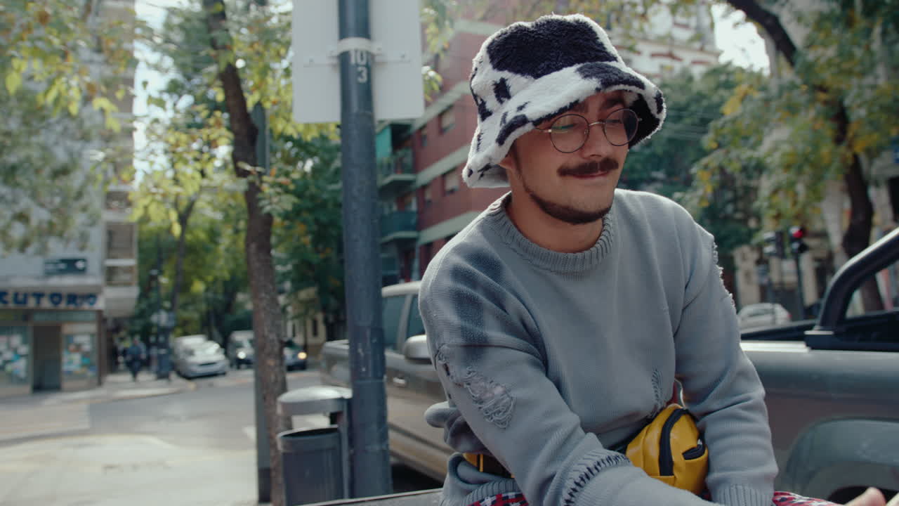 Young Hipster Man Smoking on the Street