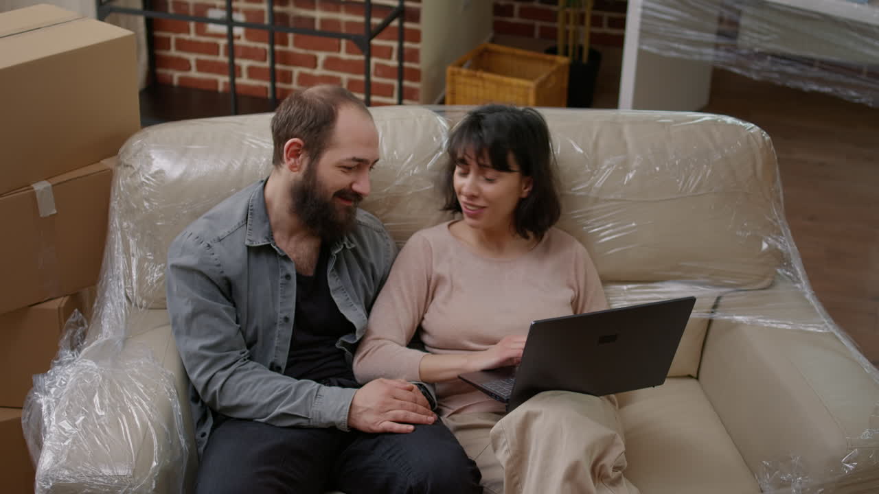 Married homeowners searching inspiration for home decoration