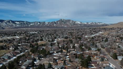 a slow drone pan over a denver colorado suburb