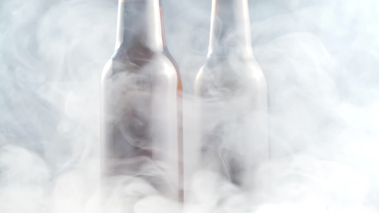 Cold Beer Bottles in Smoke