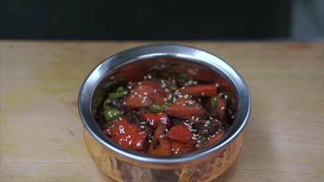 preparing a spicy vegetable dish