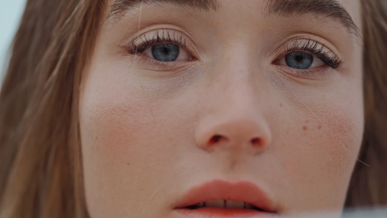 Close-up portrait of a woman with natural makeup