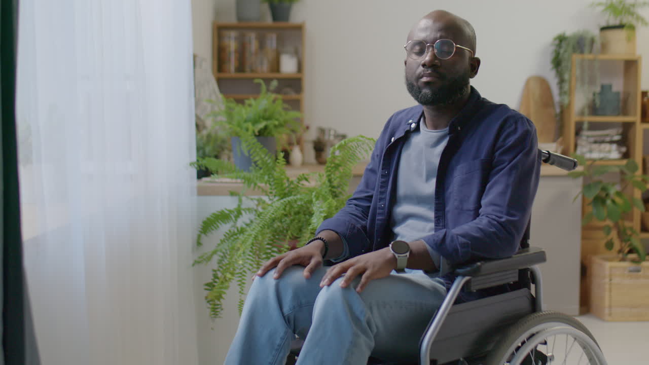 Portrait of Black Man with Disability at Home