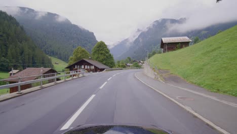 driving in the swiss alps from the famous grindelwald to lauterbrunnen in the rain