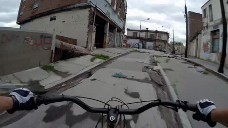 cycling through an abandoned urban street
