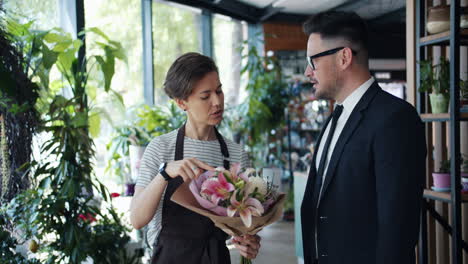customer choosing flowers at a florist