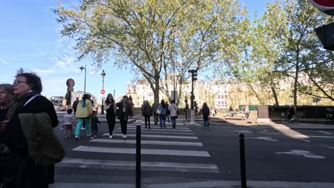 people crossing the street at different intervals