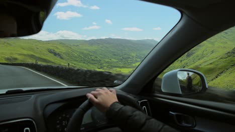 scenic driving on road trip in lush countryside and mountains of snowdonia national park - inside ca