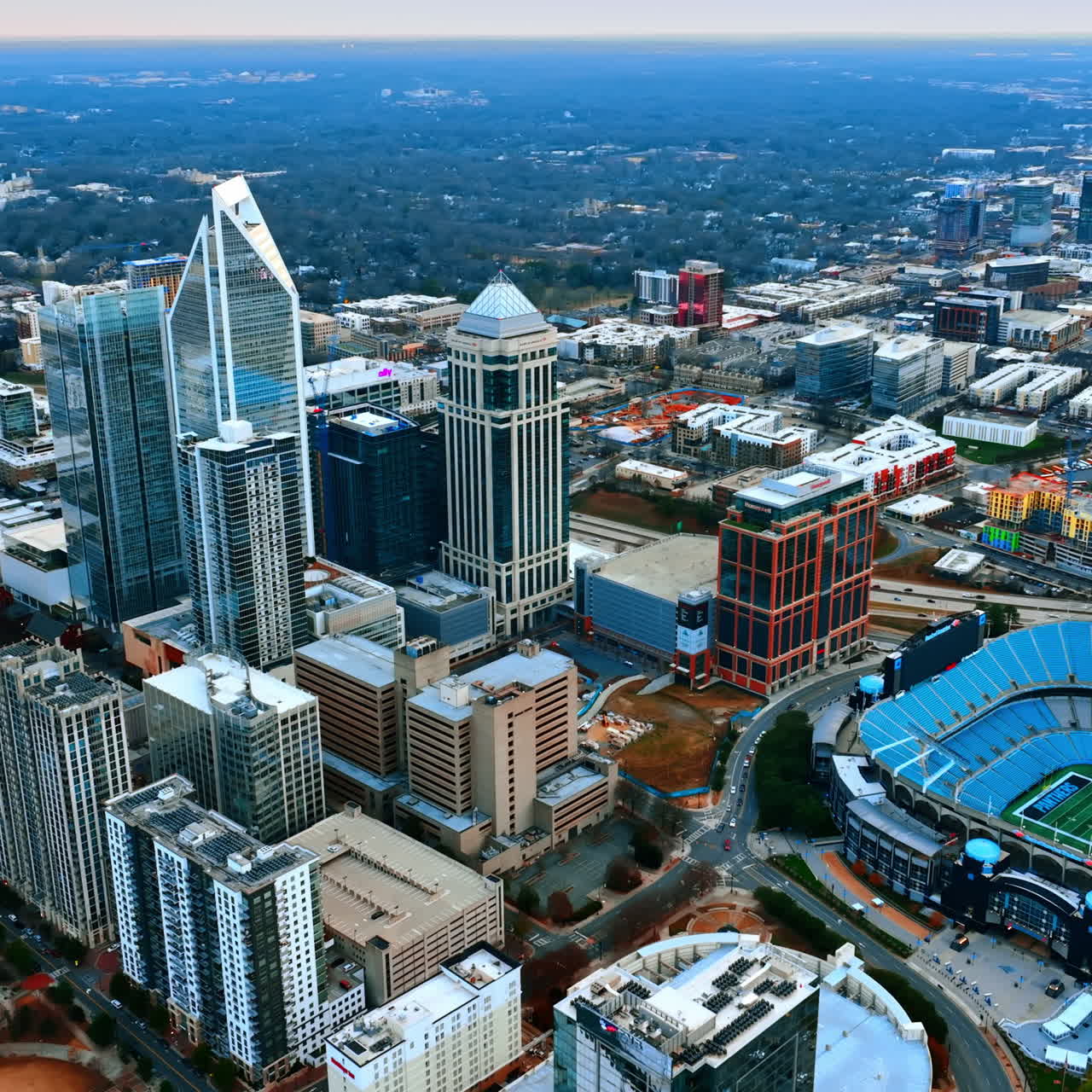 View on Bank of America Stadium in the downtown. Panorama of Charlotte, North Carolina, USA from aerial perspective.