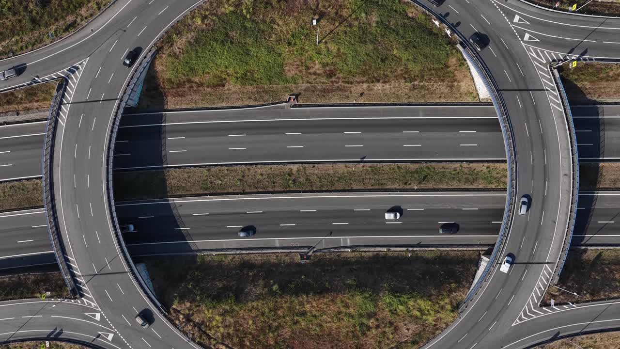 Aerial view of highway roundabout drone going up