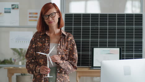 portrait of female renewable energy engineer at work