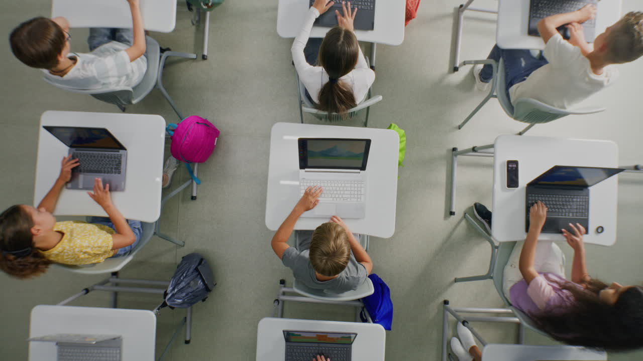 Elementary School Children Using Computers Doing Creative 3D Design Projects