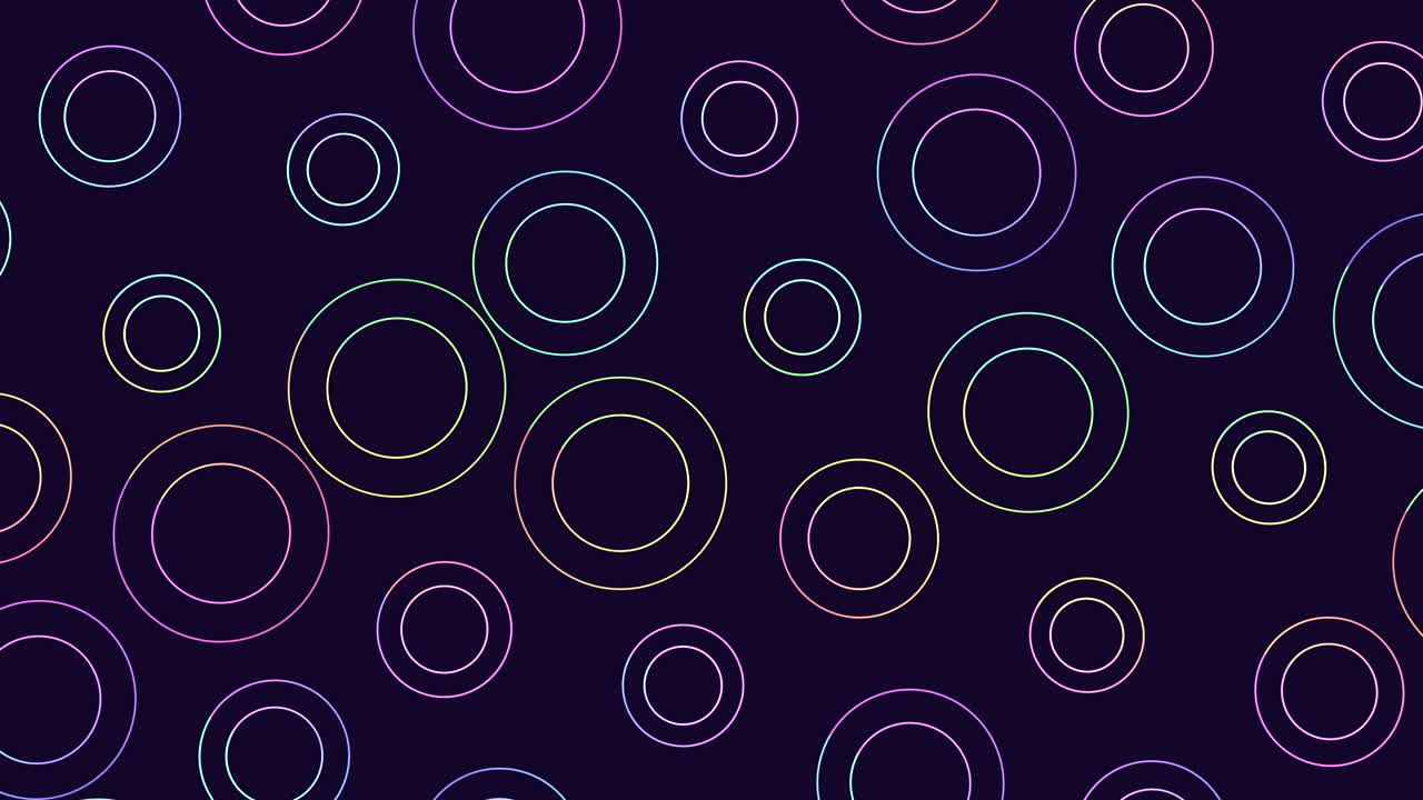 círculos flotantes vibrantes en tonos de púrpura, rosa y azul sobre un fondo negro