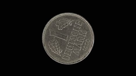 germany 1 deutsche mark 1958 reverse with oak leaves and denomination, macro loop on black background