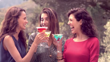 attractive women having a drink together