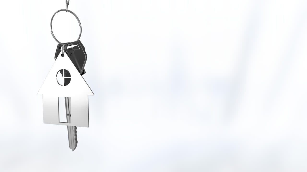Animation of silver house keys hanging against blurred background with copy space