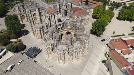 aerial pan shot around monument of unfinished chapel capelas imperfeitas in batalha, portugal