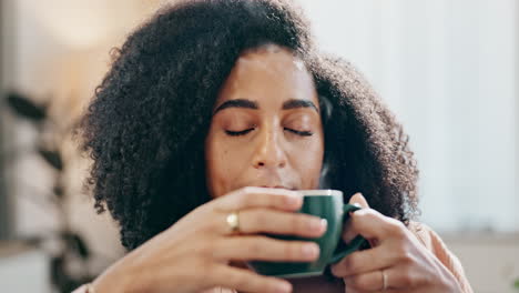 woman enjoying a cup of coffee