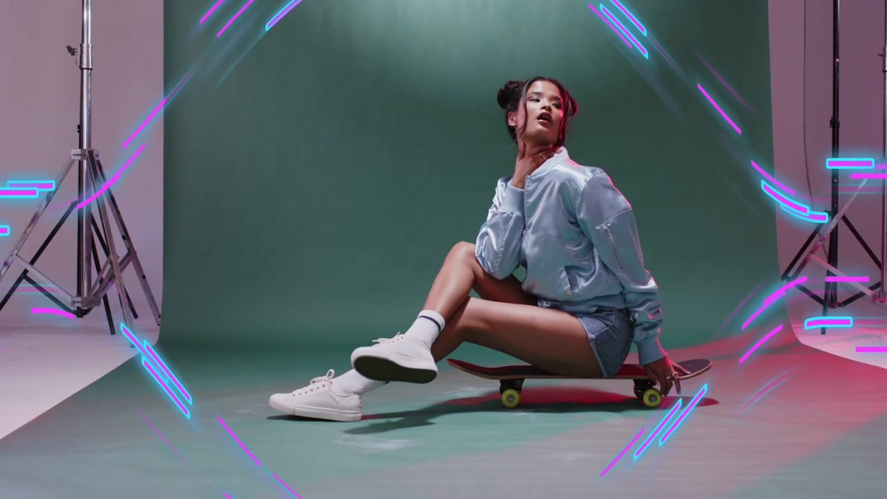 Female model sitting on skateboard in fashion modeling shifting as cuts syncing neon overlay fading