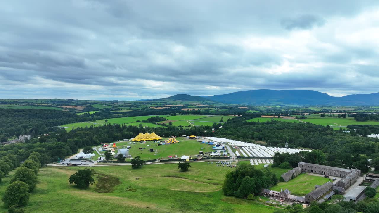 Ireland drone flying over festival site in Curraghmore Waterford in the shadow of The Comeragh Mountains