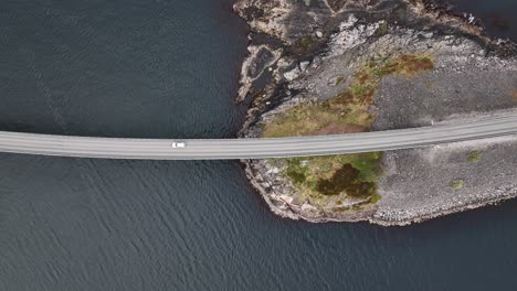 car driving across bridge, famous atlantic ocean road, norway