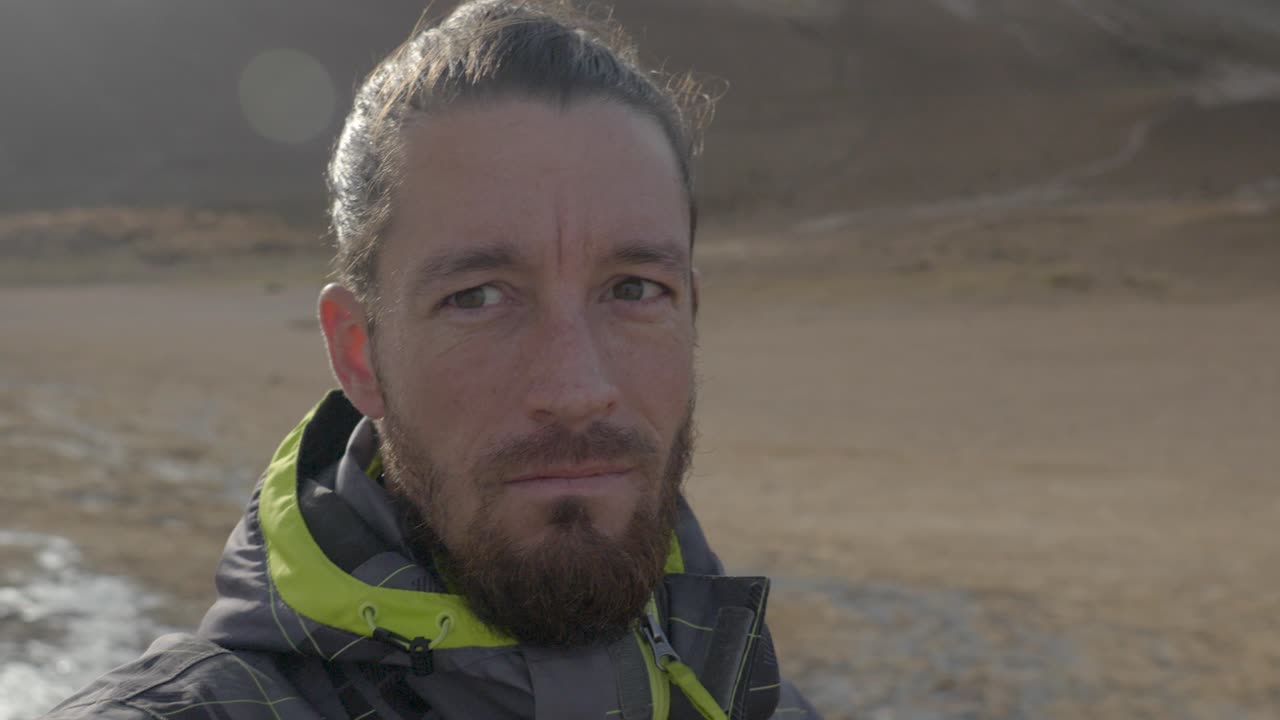 Explorer in Iceland's rugged terrain. Close Up portrait