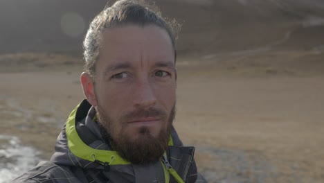 explorer in iceland's rugged terrain. close up portrait