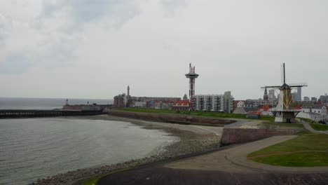 Aerial-elevated-shot-of-a-fortified-pier-with-a-stunning-panorama-of-the-city-of-Vlissingen,-Zeeland,-The-Nederlands