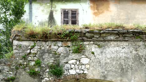 old, decaying walls of a house made of bricks, stones and boulders - the mediterranean, greece, croatia, croatia and montenegro.