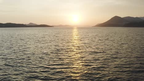 flying into the sunset over the adriana sea in dubrovnik, croatia