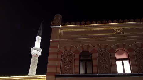 minaret of gazi husrev-bey mosque in sarajevo at night, bosnia and herzegovina