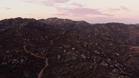 DRONE-SHOT-OF-MOUNTAINS-NEAR-ENSENADA-BAJA-CALIFORNIA-IN-MEXICO-AT-SUNSET