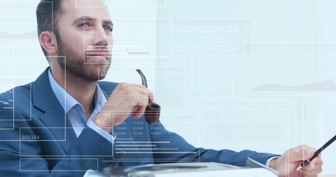 Businessman reading papers and writing notes preparing business report at desk HUD overlaying data