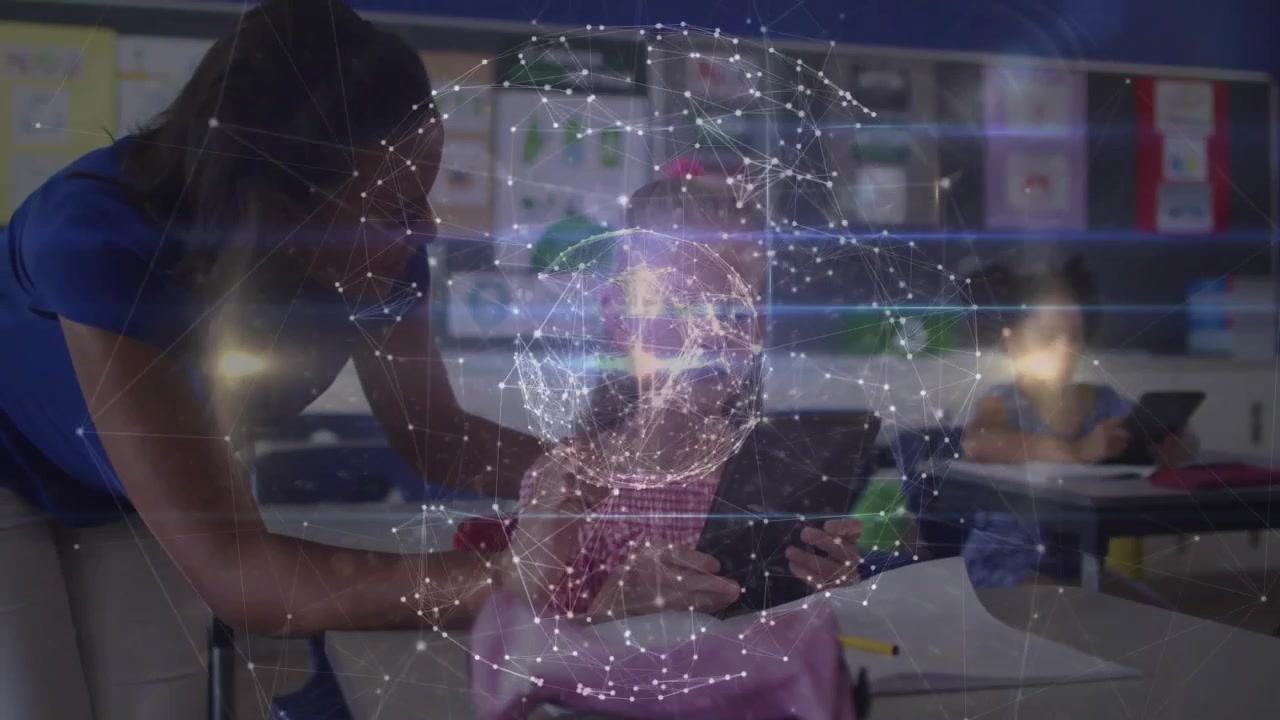 Teacher leaning over student tapping tablet, causing globe overlay and aiding classroom learning