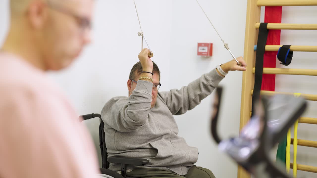 Physical therapy session for a person in a wheelchair